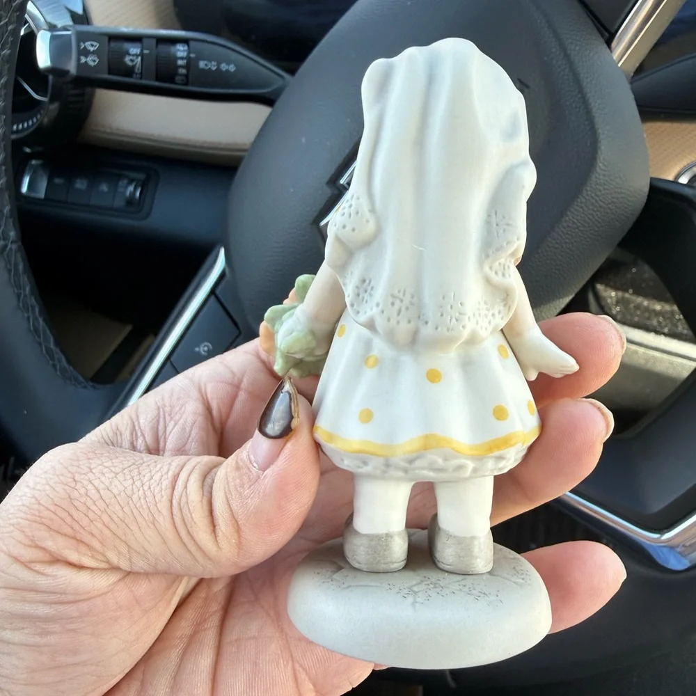 Charming Girl Figurine with Yellow Accents